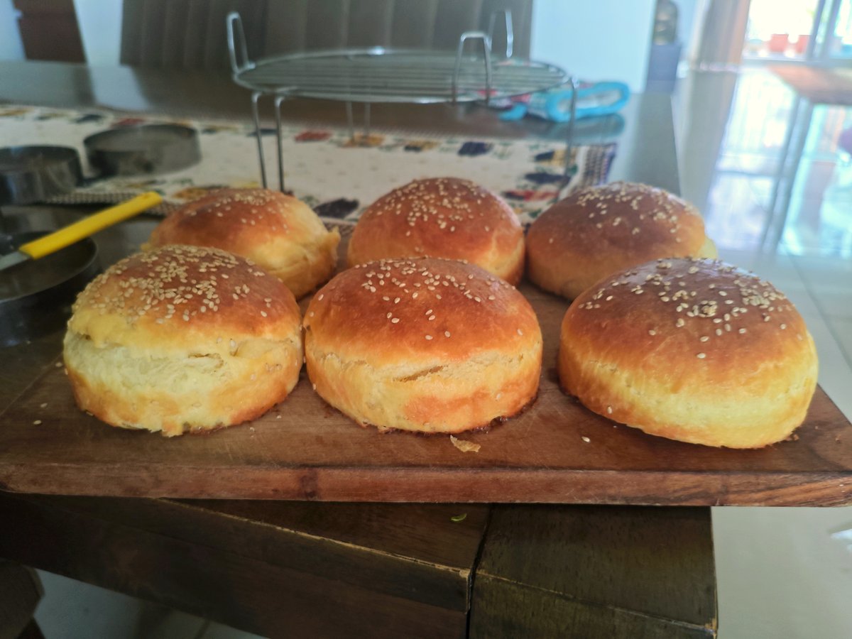 Soft, golden burger buns baked fresh by Lakshyya for Lucky Bakes